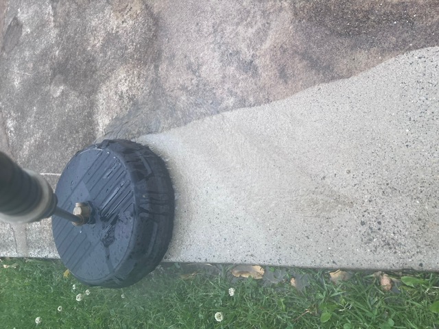 Pressure washing concrete path
